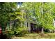 Charming two-story home featuring a classic design with a landscaped yard and inviting front porch at 30 Sessions Nw St, Marietta, GA 30060