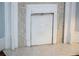 Beautiful fireplace with ornate design and tiled surround and hearth at 30 Sessions Nw St, Marietta, GA 30060