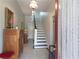 Inviting foyer with staircase, vintage lighting, and classic architectural details at 30 Sessions Nw St, Marietta, GA 30060