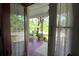 View from the front door onto a covered front porch with rocking chair at 30 Sessions Nw St, Marietta, GA 30060