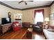 Inviting living room boasting hardwood floors, neutral walls, a large window, and classic furnishings at 30 Sessions Nw St, Marietta, GA 30060