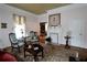 Cozy living room featuring classic décor, fireplace, and access to other rooms at 30 Sessions Nw St, Marietta, GA 30060