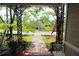 View from the porch featuring decorative iron railings and a view of the street and garden at 30 Sessions Nw St, Marietta, GA 30060