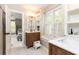Charming bathroom featuring double vanities and a window seat with natural light at 3380 Hill Forest Nw Trl, Acworth, GA 30101