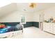 Well-lit bedroom with wainscoting, a classic ceiling fan, and a spacious feel at 3380 Hill Forest Nw Trl, Acworth, GA 30101