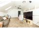 Spacious bonus room features plush carpet, skylights, and a comfortable seating area at 3380 Hill Forest Nw Trl, Acworth, GA 30101