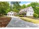 Beautiful exterior showcasing the home, garage, large lot, and well-maintained landscaping at 3380 Hill Forest Nw Trl, Acworth, GA 30101