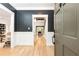 Bright and airy foyer with hardwood floors and open doorway, showcasing the home's layout at 3380 Hill Forest Nw Trl, Acworth, GA 30101
