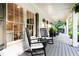 Inviting front porch with rocking chairs and large windows, perfect for enjoying the outdoors at 3380 Hill Forest Nw Trl, Acworth, GA 30101