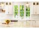 Bright kitchen showcasing marble countertops, stainless appliances, and a large island at 3380 Hill Forest Nw Trl, Acworth, GA 30101