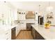 Spacious kitchen featuring stainless steel appliances, a large island, and contemporary design at 3380 Hill Forest Nw Trl, Acworth, GA 30101