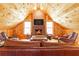 Cozy living room with wood beam ceiling and fireplace, perfect for relaxation at 3380 Hill Forest Nw Trl, Acworth, GA 30101
