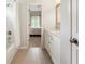 Bright bathroom with white vanity, marble countertop, and bathtub-shower combination with neutral finishes at 1273 Promontory Ln, Marietta, GA 30062
