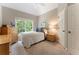 Cozy bedroom with soft carpeting, large windows and a comfortable single bed at 1273 Promontory Ln, Marietta, GA 30062