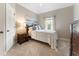 Light-filled bedroom featuring a single bed, soft carpet, and natural light at 1273 Promontory Ln, Marietta, GA 30062