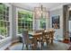 Dining room with natural light, chandelier and view to the backyard at 1273 Promontory Ln, Marietta, GA 30062