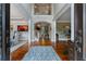 Grand foyer with gleaming hardwood floors, soaring ceilings, and elegant staircase, creating a stunning entrance at 1273 Promontory Ln, Marietta, GA 30062