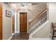 Hallway features hardwood floors, staircase, and access to other areas of the home at 1273 Promontory Ln, Marietta, GA 30062