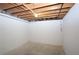 Unfinished basement with painted walls, concrete floor, and exposed ceiling at 443 Indian Hills Dr, Dallas, GA 30157