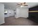 An open floor plan with a fireplace and wood-look floors and recessed lighting at 443 Indian Hills Dr, Dallas, GA 30157