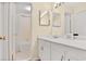 Bathroom with white vanity and a tub and shower combo, showcasing clean design and functionality at 8740 Roswell Rd # 9C, Atlanta, GA 30350