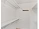 Bright walk-in closet with white shelving and racks, offering ample storage space at 8740 Roswell Rd # 9C, Atlanta, GA 30350
