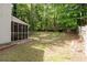 A spacious backyard provides an abundance of space for outdoor activities at 1034 Hillsborough Nw, Kennesaw, GA 30144