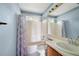 Bathroom with a tub-shower combo and a single sink at 1034 Hillsborough Nw, Kennesaw, GA 30144