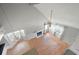 Bright living room with a vaulted ceiling, fireplace, and lots of windows at 1034 Hillsborough Nw, Kennesaw, GA 30144