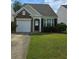 Charming single-Gathering home with a manicured lawn, garage, and well-maintained landscaping at 1692 Woodsford Nw Rd, Kennesaw, GA 30152