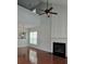 Elegant living room with a soaring ceiling, fireplace, and natural light at 1692 Woodsford Nw Rd, Kennesaw, GA 30152