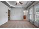 Large bedroom features tray ceilings, carpet, and two large windows at 2268 Limehurst Ne Dr # 120, Atlanta, GA 30319