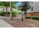 Community dog park with waste station, surrounded by trees and shrubs at 2268 Limehurst Ne Dr # 120, Atlanta, GA 30319