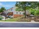 Well-maintained exterior with landscaped grounds and green spaces near townhomes at 2268 Limehurst Ne Dr # 120, Atlanta, GA 30319