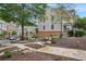 Beautifully landscaped walking path and green space outside townhomes at 2268 Limehurst Ne Dr # 120, Atlanta, GA 30319