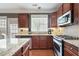 Functional kitchen with stainless steel appliances, granite countertops, and ample cabinet space at 2268 Limehurst Ne Dr # 120, Atlanta, GA 30319