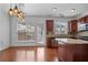 Modern kitchen with granite countertops, stainless steel appliances, and hardwood floors at 2268 Limehurst Ne Dr # 120, Atlanta, GA 30319