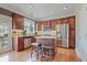Well-equipped kitchen with stainless steel appliances, granite countertops, and a breakfast bar at 2268 Limehurst Ne Dr # 120, Atlanta, GA 30319