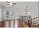 Bright living room with hardwood floors, decorative chandelier, and access to outdoor space at 2268 Limehurst Ne Dr # 120, Atlanta, GA 30319