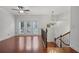 Spacious living room with hardwood floors, ceiling fan, and large windows providing natural light at 2268 Limehurst Ne Dr # 120, Atlanta, GA 30319