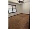 Bedroom with neutral carpet, a window with wood blinds, and a ceiling fan at 260 Amanda Ct, Stockbridge, GA 30281