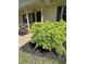 Inviting covered porch with decorative railings and shuttered windows, offering a warm curb appeal at 260 Amanda Ct, Stockbridge, GA 30281