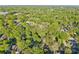 High-angle shot of a residential area nestled within a forest, highlighting the green canopy at 39 Wyman Se St, Atlanta, GA 30317