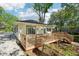 Back view of a house featuring a wooden deck and stairs, perfect for entertaining at 39 Wyman Se St, Atlanta, GA 30317