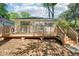 Exterior view of house showcasing wooden back deck with stairs, perfect for outdoor living at 39 Wyman Se St, Atlanta, GA 30317