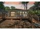 Large wooden deck in backyard with stairs provides ample outdoor entertaining space at 39 Wyman Se St, Atlanta, GA 30317
