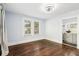 Bedroom featuring hardwood floors and access to a bathroom at 39 Wyman Se St, Atlanta, GA 30317