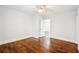 Bedroom features hardwood flooring, a ceiling fan, a closet and natural light at 39 Wyman Se St, Atlanta, GA 30317