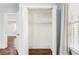 Empty closet with double doors, offering ample storage space and hardwood floors at 39 Wyman Se St, Atlanta, GA 30317