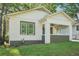 Charming home with a well-maintained lawn, covered front porch, and beautiful curb appeal at 39 Wyman Se St, Atlanta, GA 30317